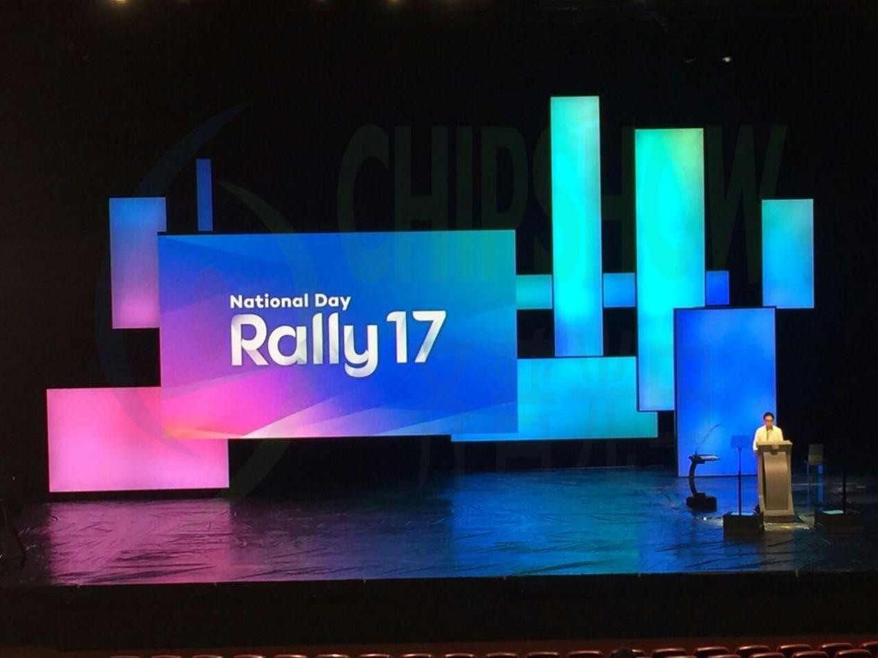 Indoor stage LED screen display for National Day Rally with creative multi-panel rectangular configuration