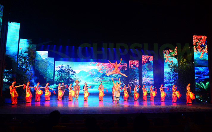 Dynamic stage background LED screens featuring high-definition nature visuals for a traditional dance performance