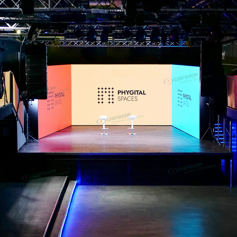 Three-sided indoor LED video wall for immersive Phygital Spaces corporate presentation and keynote stage