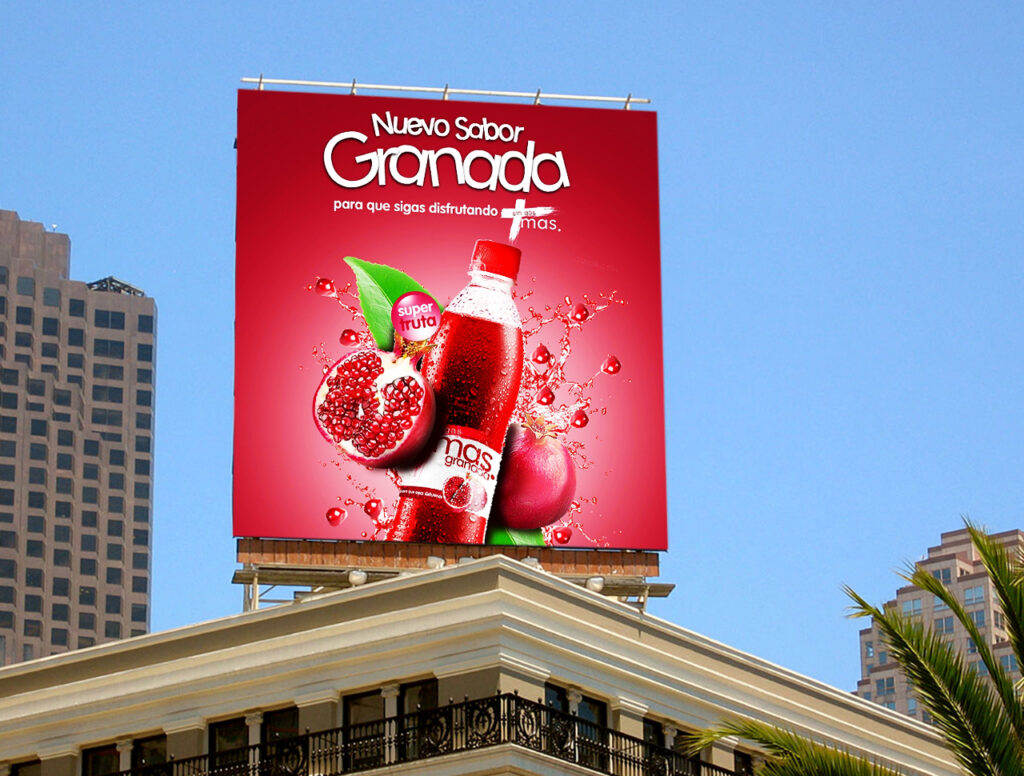 LED billboard ad for Granada pomegranate juice drink displayed outdoors on a building rooftop with bold red visuals