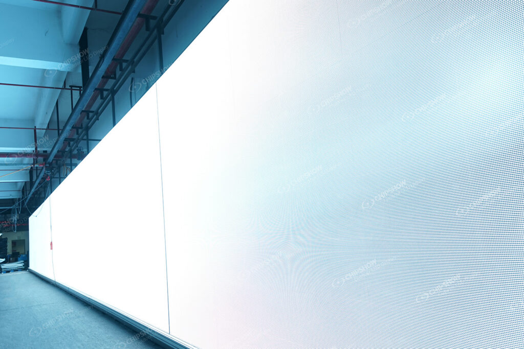 Full LED wall under factory aging test, illustrating the burn-in and power-on verification performed before site delivery.