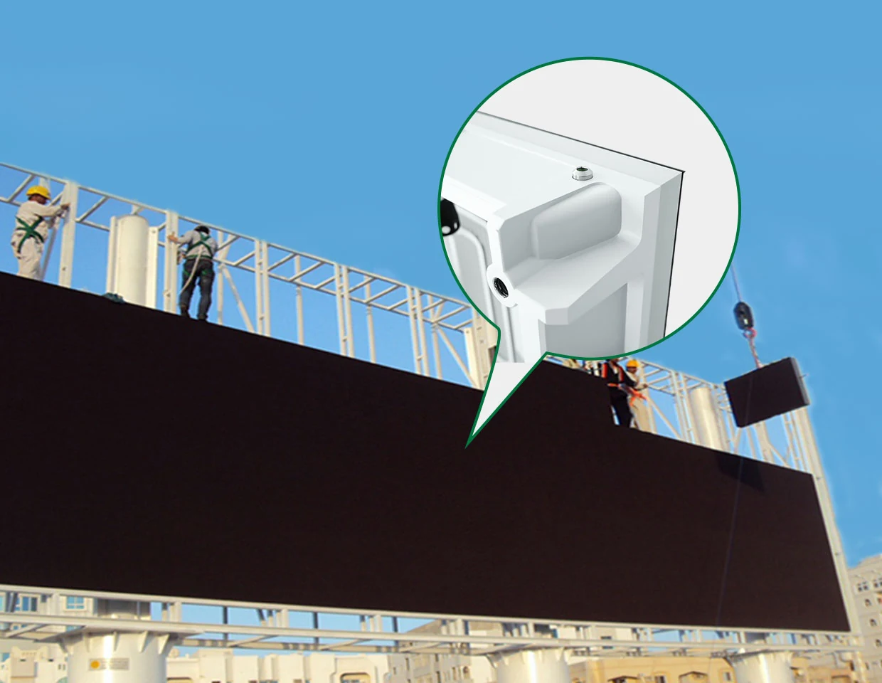 Outdoor LED billboard installation with close-up detail of cabinet corner and mounting structure