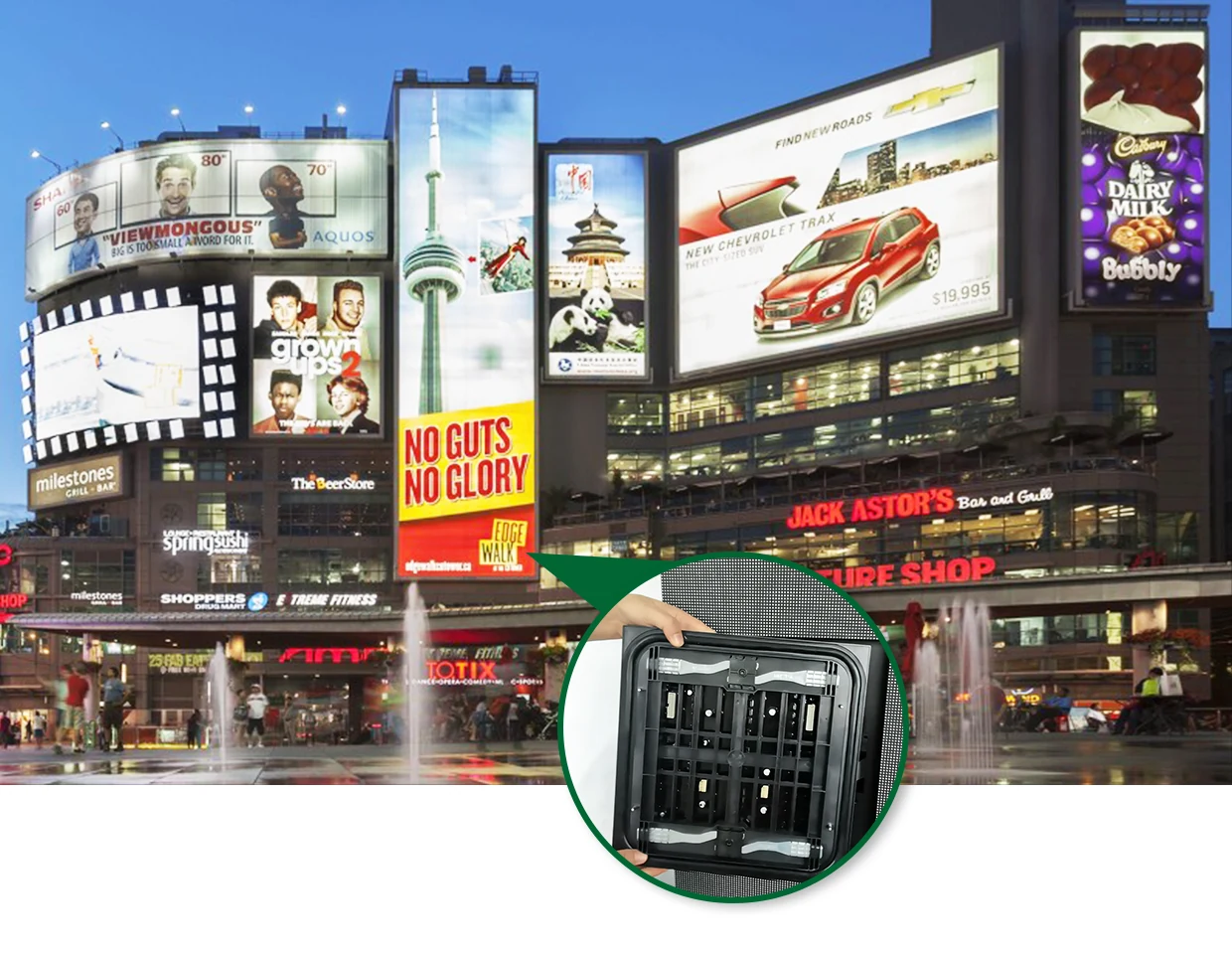 Commercial LED billboard displays in a city plaza with rear cabinet structure inset