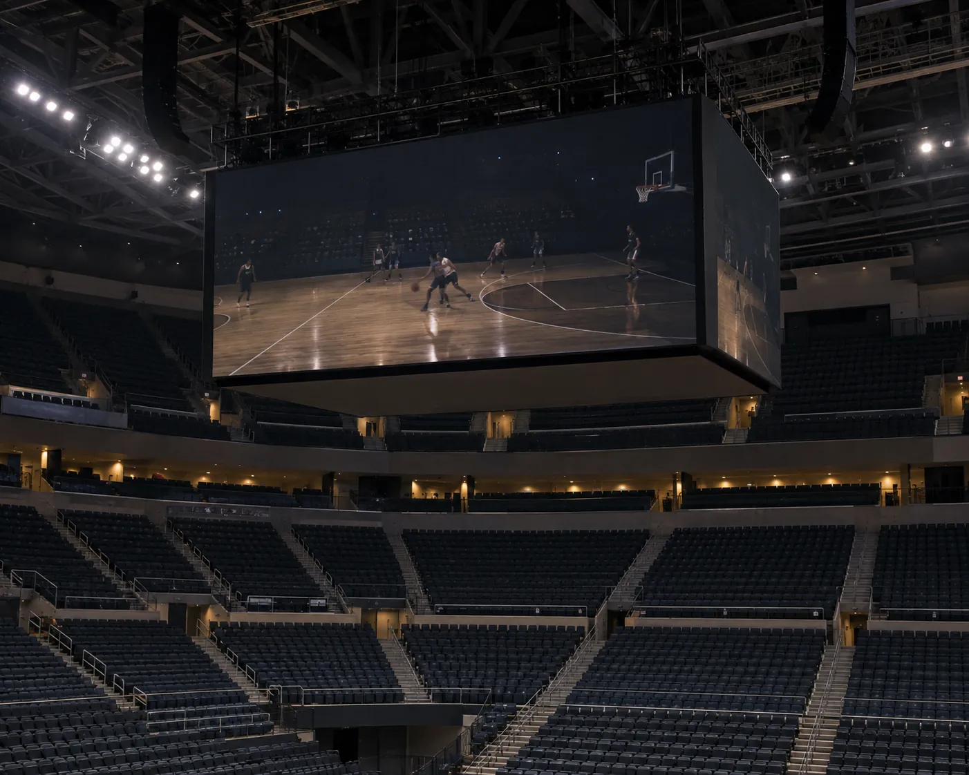 Concept scene of an indoor arena with a center-hung style video board showing a realistic dim replay-like court view without readable text above rows of seats; not a real venue or event record.